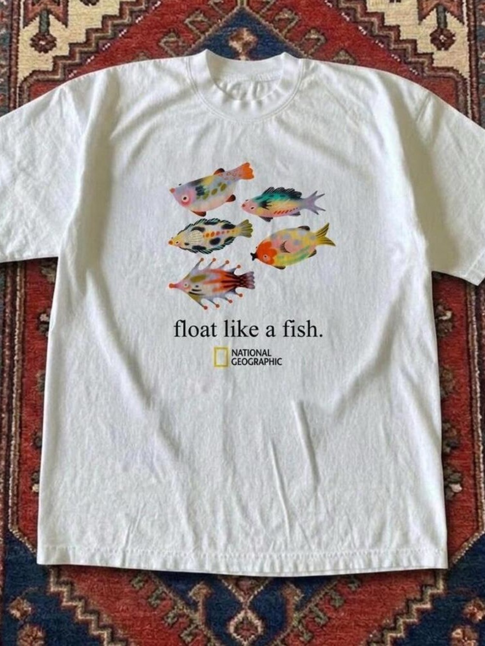 White National Geographic float like a fish T shirt